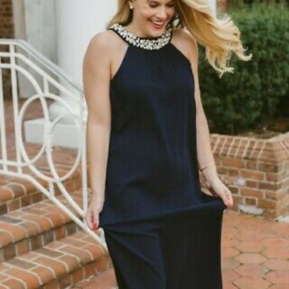 Formal black dress with beaded neckline.